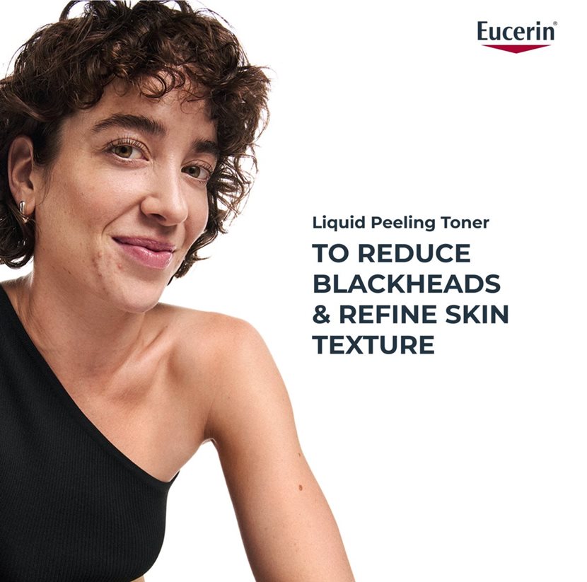 Woman with a blackhead removal product advertisement featuring Eucerin.