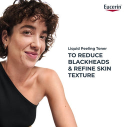 Woman with a blackhead removal product advertisement featuring Eucerin.