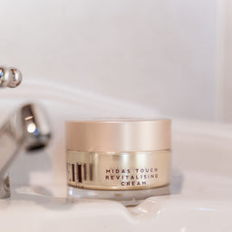 Midas Touch Revitalising Cream on a sink 