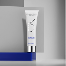 White ZO Skin Health Enzymatic Peel on blue shelf with grey background