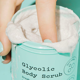 a ultra closeup of a Frank Body Glycolic Body Scrub 