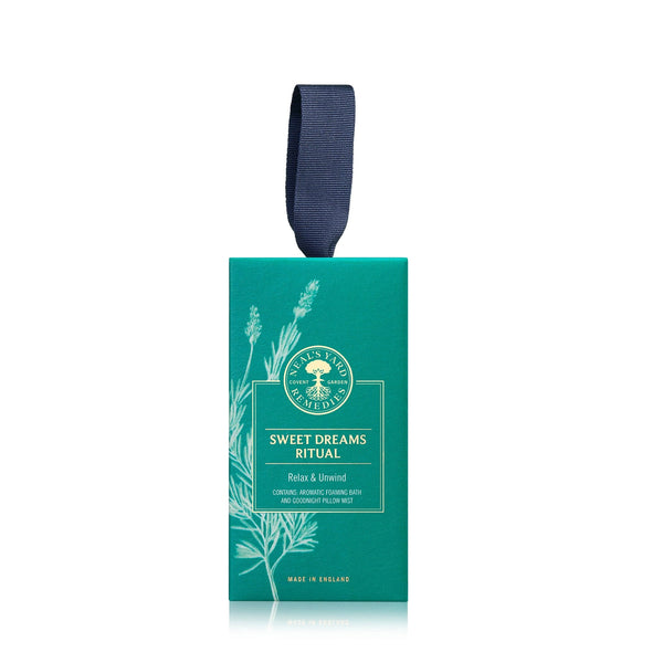 Teal packaging of 'Sweet Dreams Ritual' with a ribbon on a white background