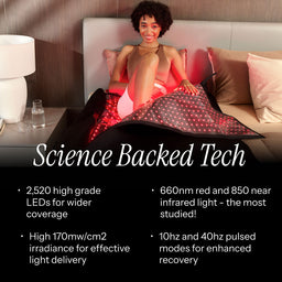 Woman lying on a red light therapy blanket with product features highlighted.