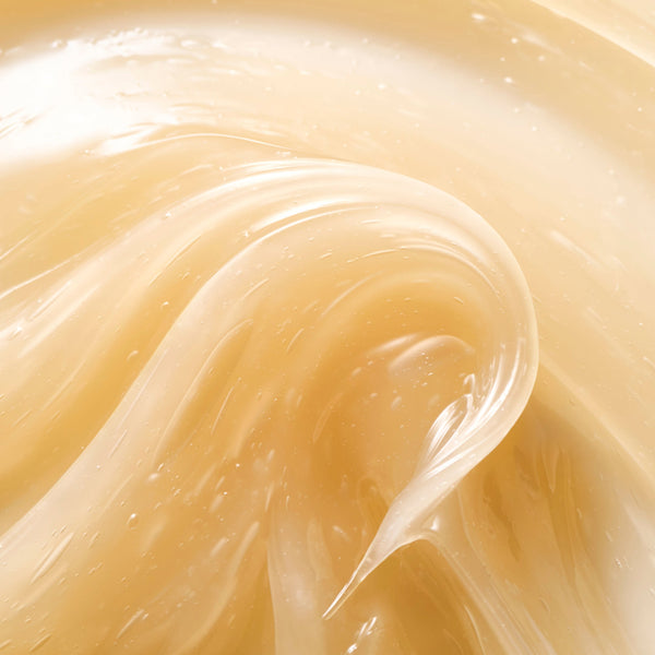 Close-up of creamy beige substance with a swirling pattern