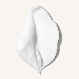 White swatch on a light beige background